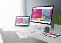 Picture showing a website opened on a computer, tablet and mobile device for an article titled - can a website help grow business